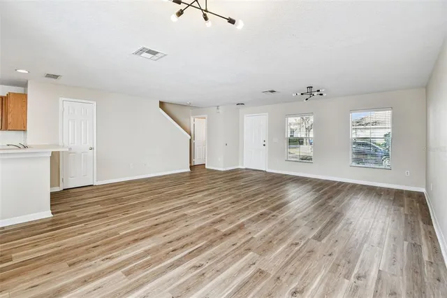 a view of an empty walk in closet