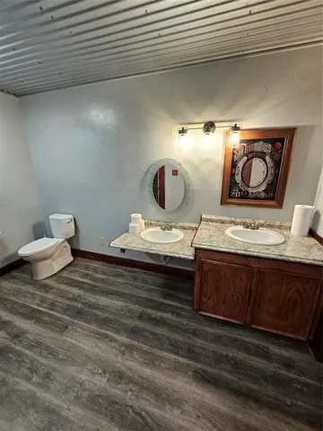 a view of a hall with a ceiling fan