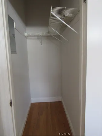 a kitchen with cabinets appliances a sink and a window
