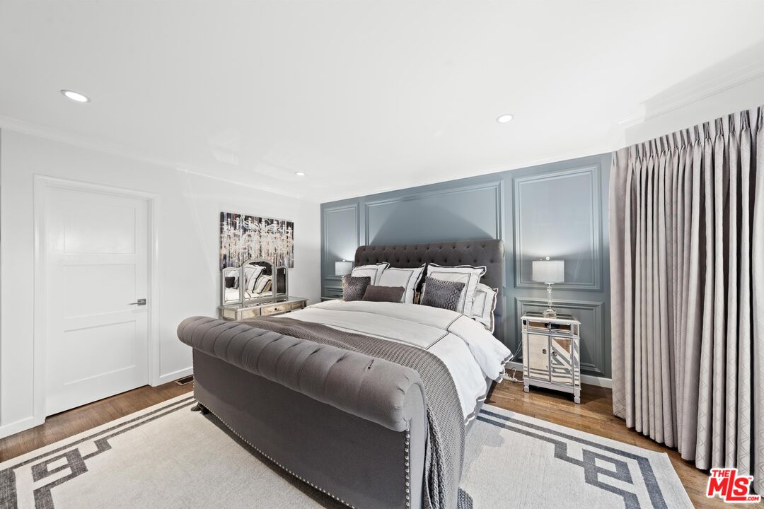 95 Anita Drive Pasadena, CA 91105 - Photo 19 of 31 a bedroom with a bed and a window