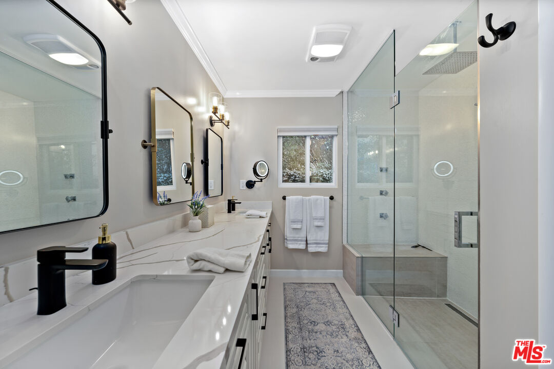 95 Anita Drive Pasadena, CA 91105 - Photo 20 of 31 a bathroom with a tub sink shower and mirror