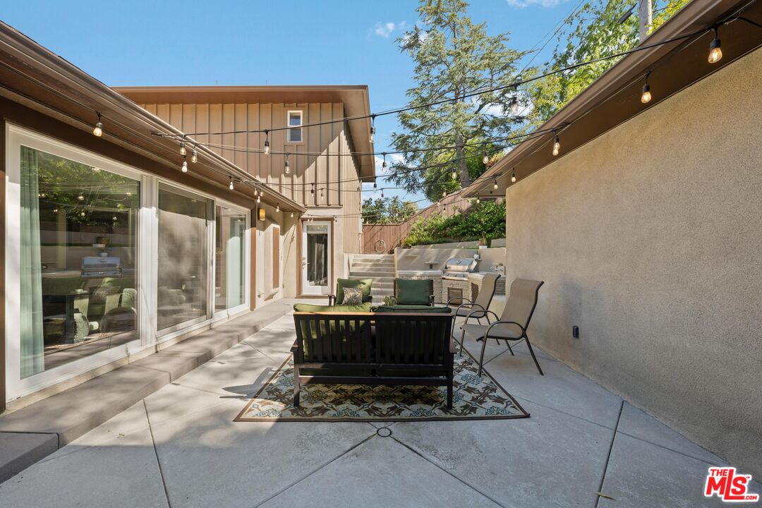 95 Anita Drive Pasadena, CA 91105 - Photo 24 of 31 a view of balcony with table and chairs