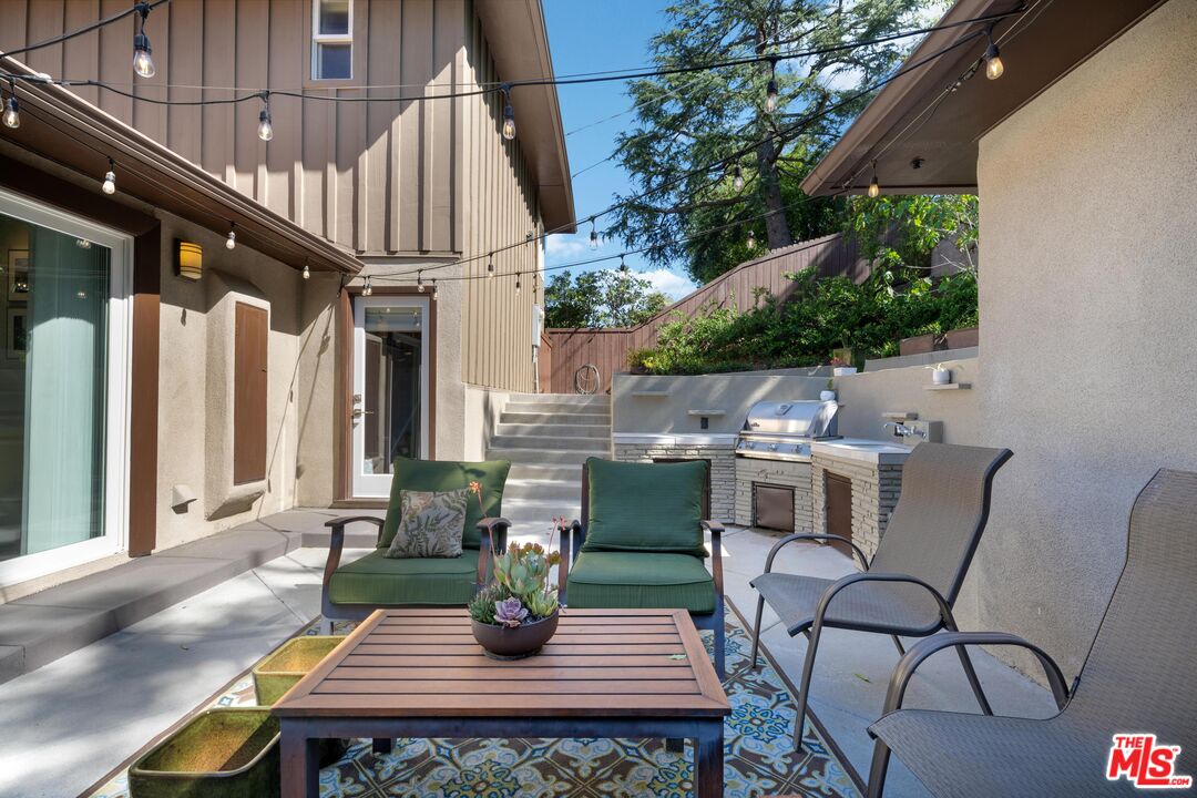 95 Anita Drive Pasadena, CA 91105 - Photo 25 of 31 a view of an outdoor space with seating