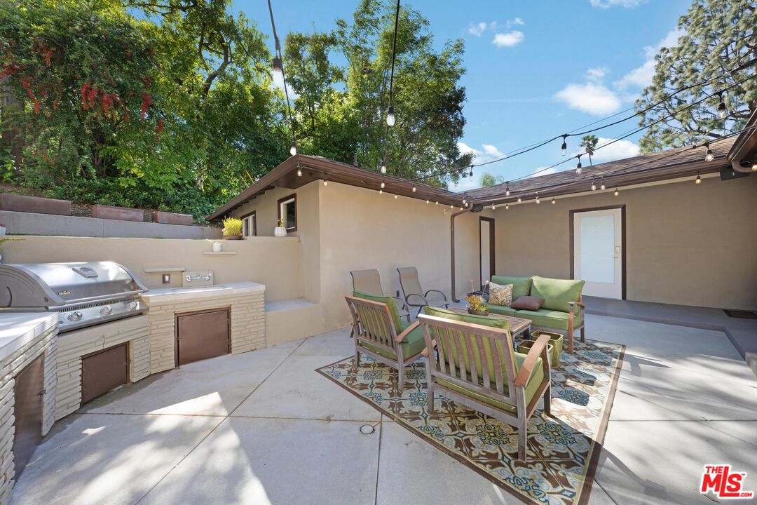 95 Anita Drive Pasadena, CA 91105 - Photo 27 of 31 a view of a patio with a yard