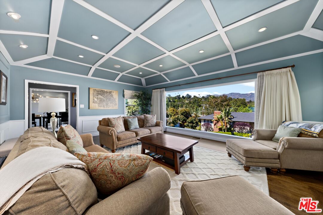 95 Anita Drive Pasadena, CA 91105 - Photo 3 of 31 a living room with furniture and a large window