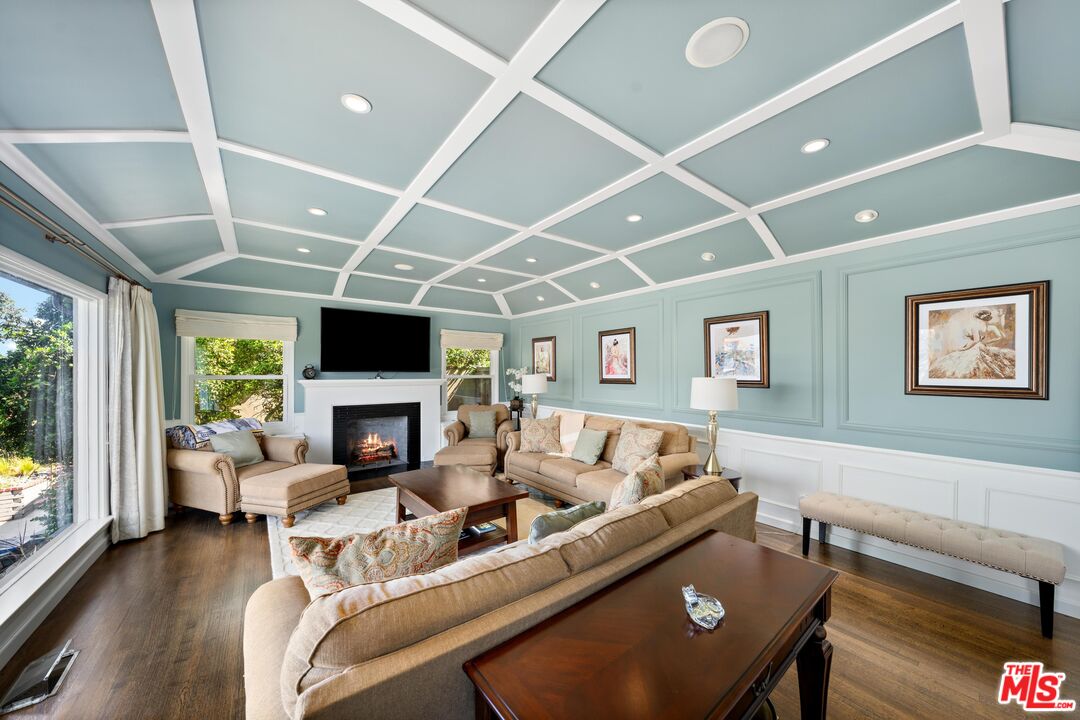 95 Anita Drive Pasadena, CA 91105 - Photo 5 of 31 a living room with furniture fireplace and a flat screen tv