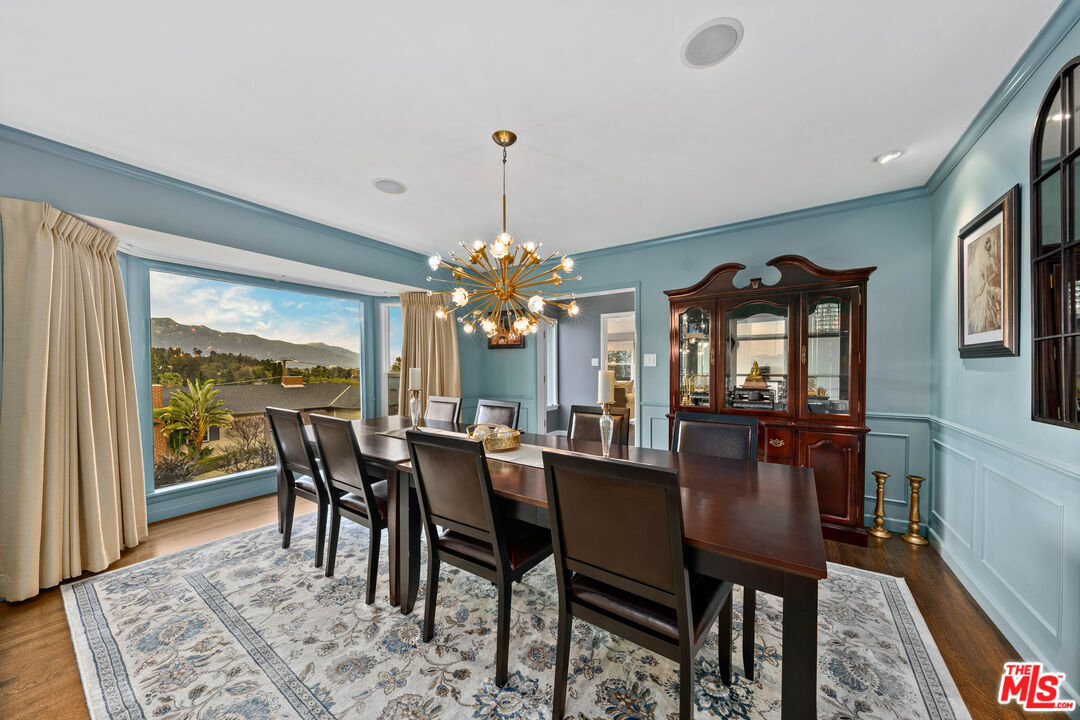 95 Anita Drive Pasadena, CA 91105 - Photo 8 of 31 a view of a dining room with furniture window and wooden floor