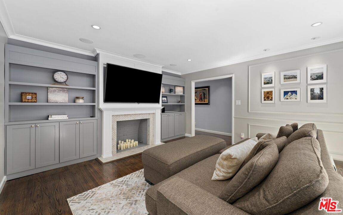 95 Anita Drive Pasadena, CA 91105 - Photo 9 of 31 a living room with furniture fireplace and flat screen tv