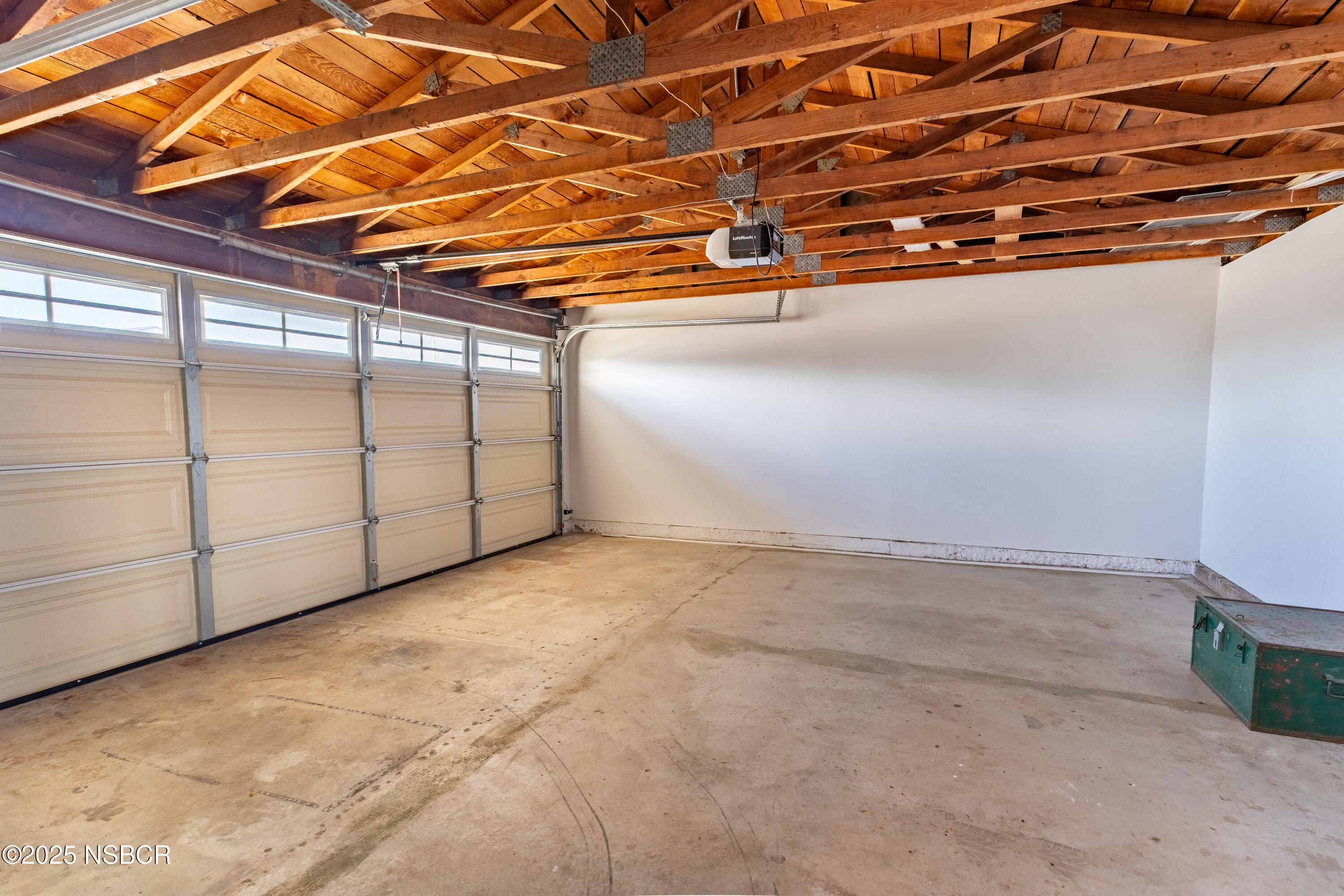 4564 South Bradley Road Santa Maria, CA 93455 - Photo 15 of 16 a view of a garage with wooden floor