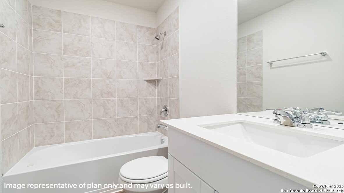14731 Clay Rdg Run San Antonio, TX 78253 - Photo 25 of 55 a bathroom with a sink a toilet and bathtub