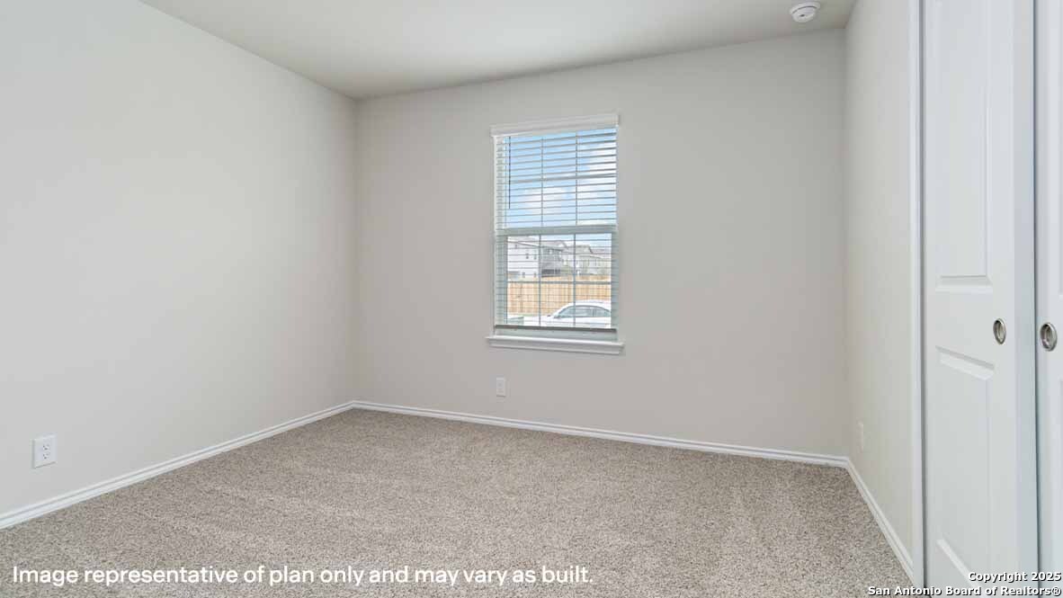 14731 Clay Rdg Run San Antonio, TX 78253 - Photo 27 of 55 an empty room with a window