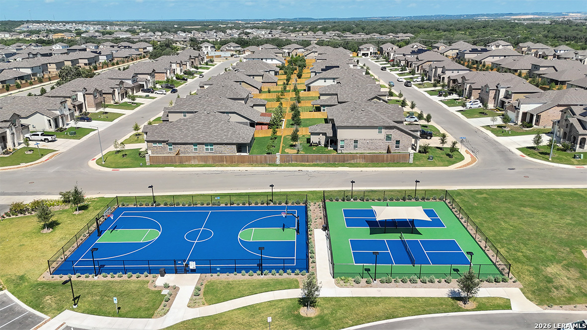 14731 Clay Rdg Run San Antonio, TX 78253 - Photo 38 of 55 an aerial view of residential houses with outdoor space and parking
