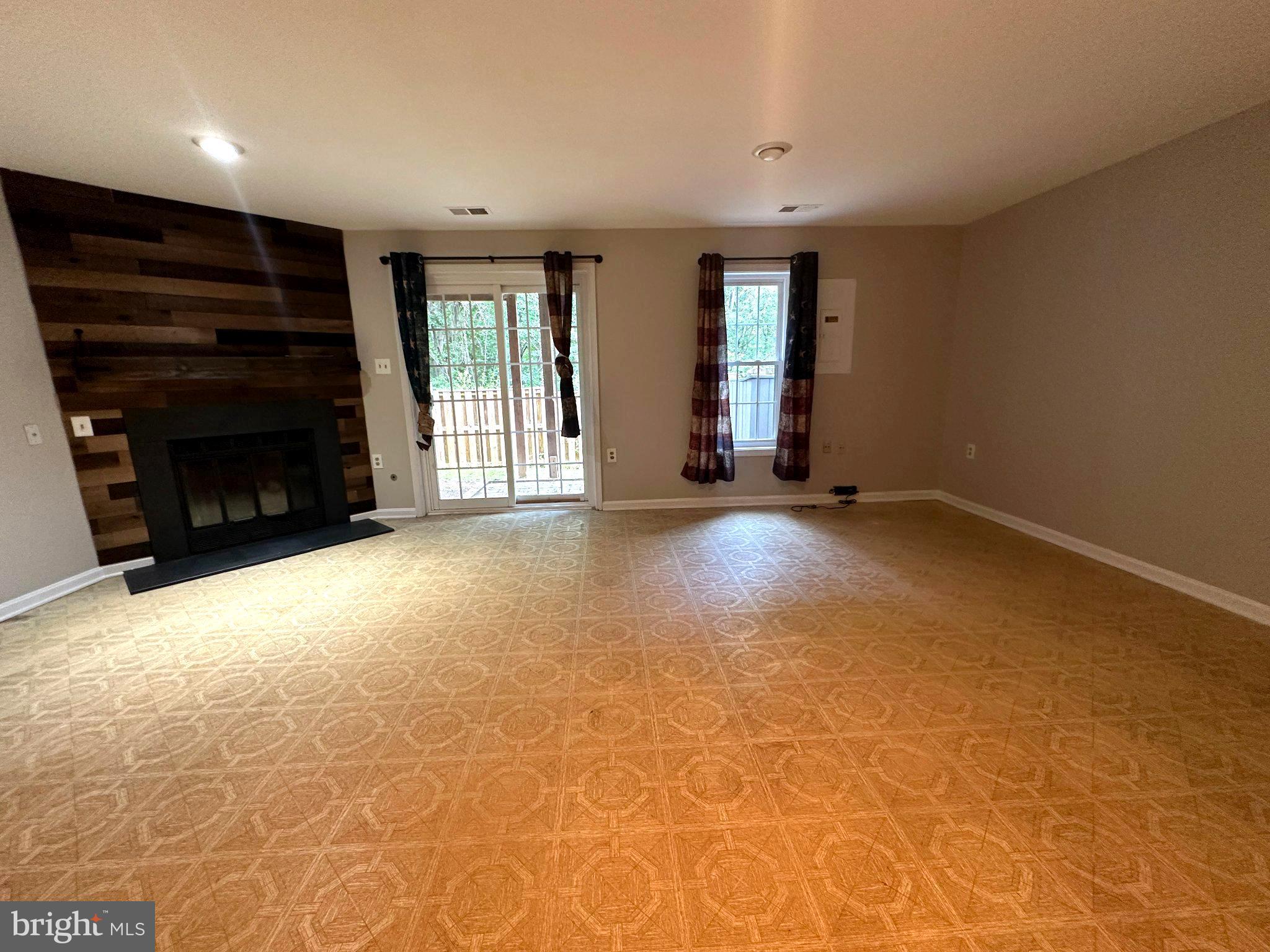 11928 Sentinel Point Court Reston, VA 20191 - Photo 20 of 23 Spacious living area with natural light.