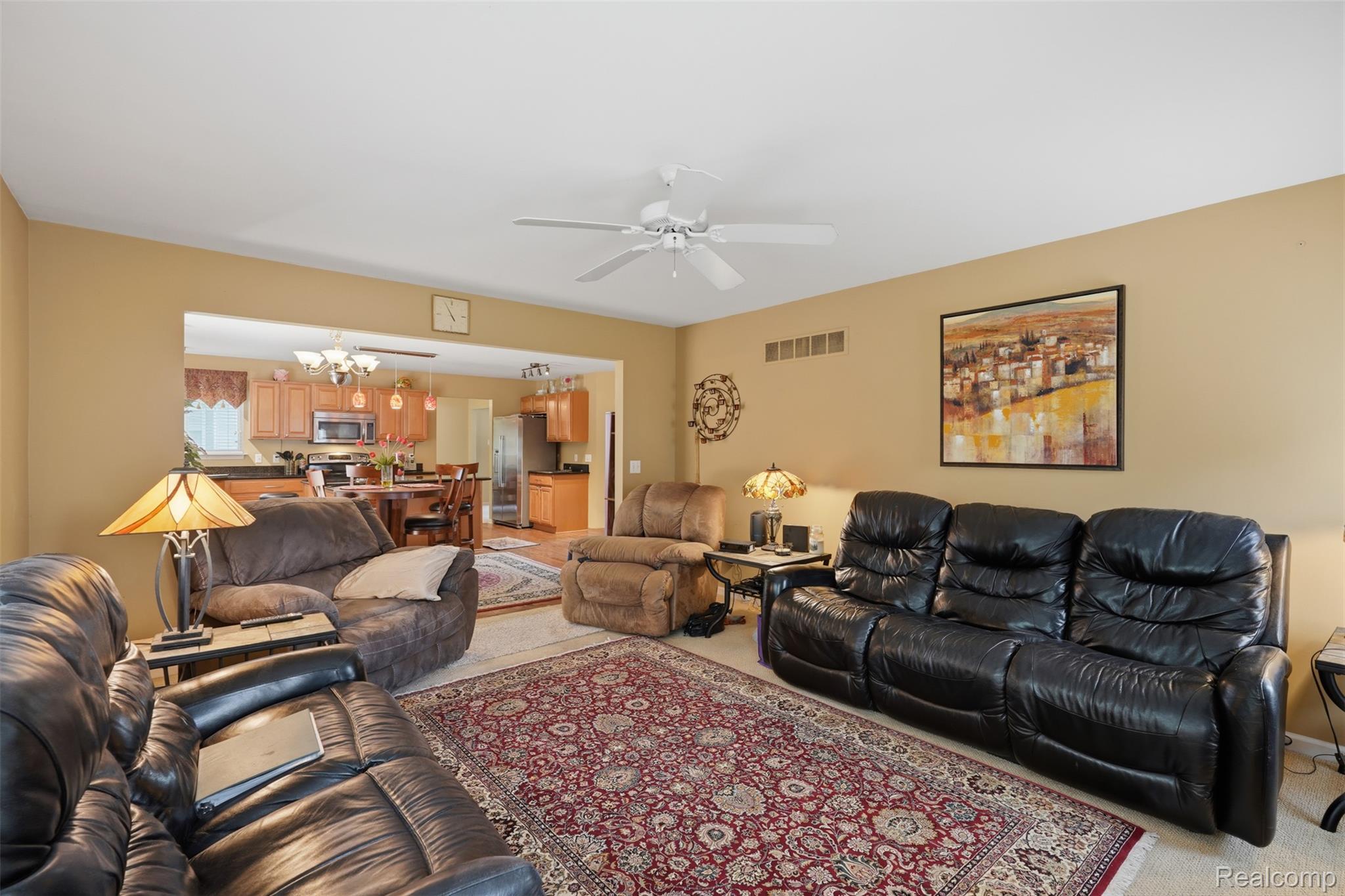 170 Fairhill Way Howell, MI 48843 - Photo 16 of 46 Open concept living space with recessed lighting and a ceiling fan