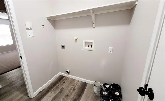 a view of small space with wooden floor