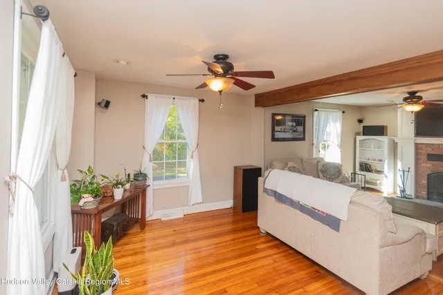 a living room with furniture and a window