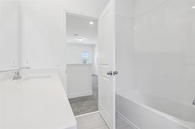 a bathroom with a bathtub