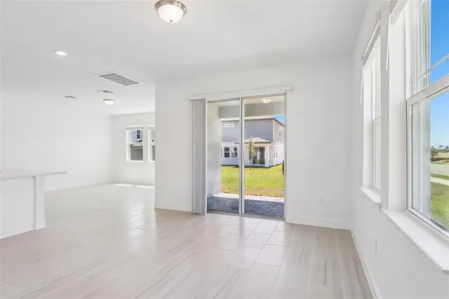 a view of an empty room and window