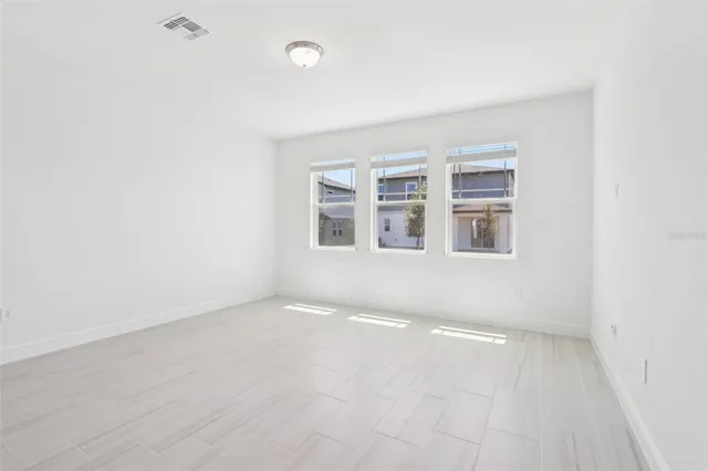 an empty room with windows