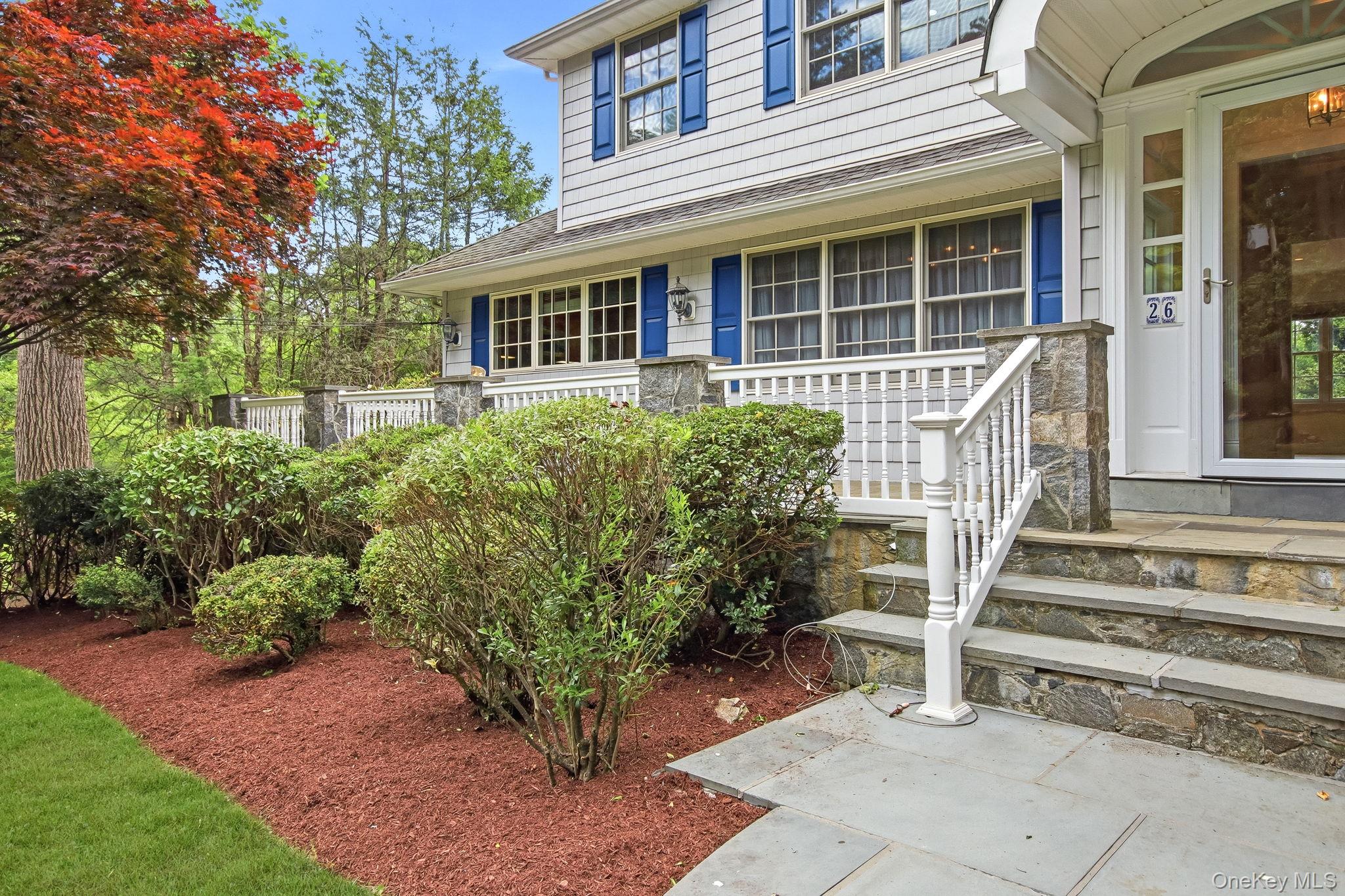 26 Century Ridge Road Purchase, NY 10577 - Photo 3 of 50 Stone facade entry featuring bluestone steps with a white railing