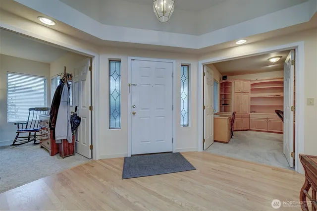 a view of a workspace with furniture