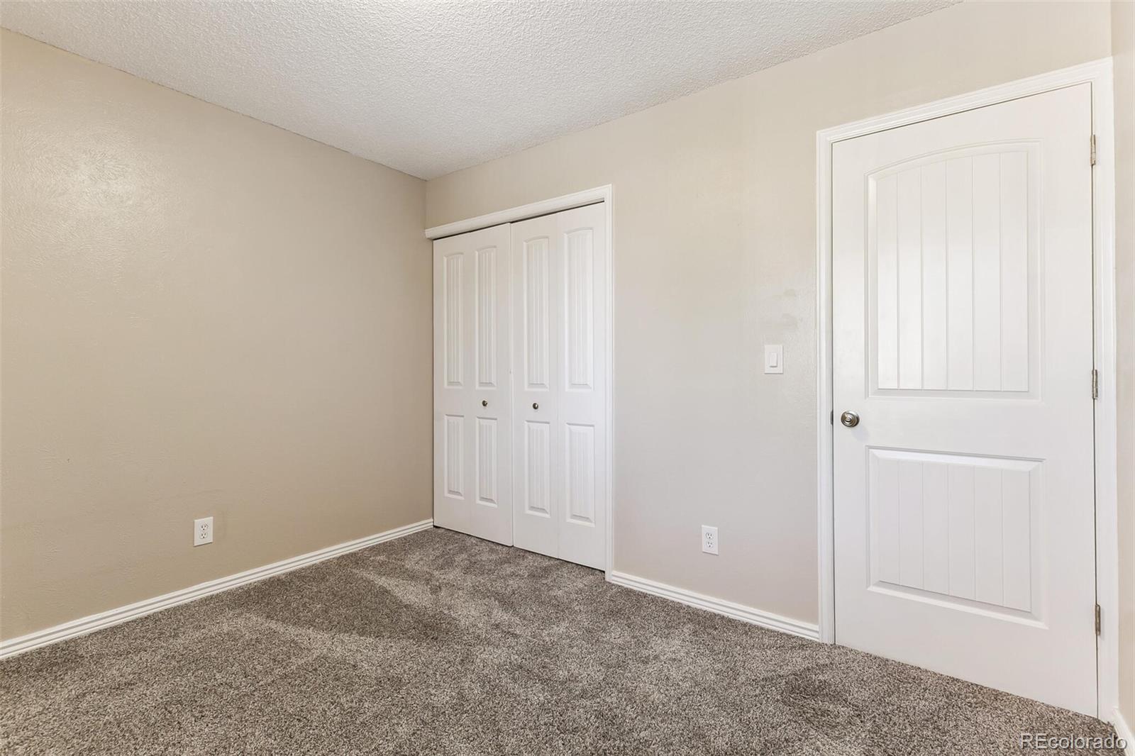 8417 Everett Way, Unit C Arvada, CO 80005 - Photo 26 of 34 a view of an empty room