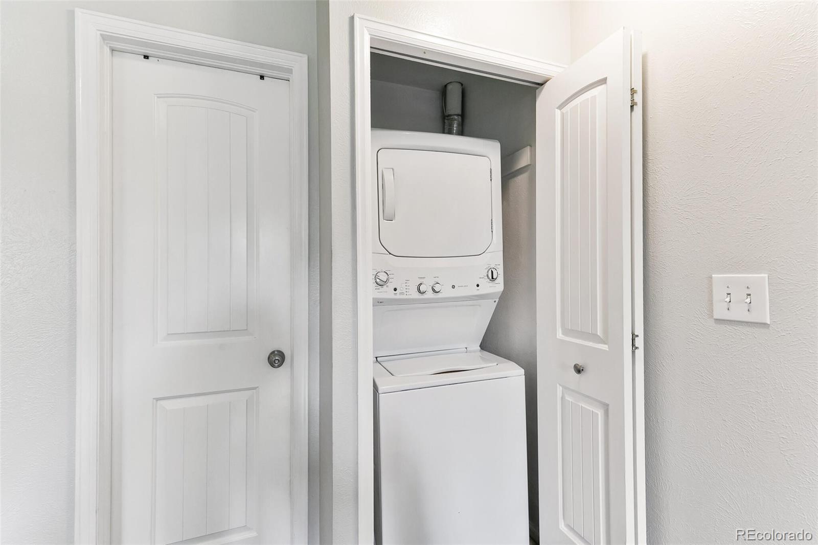 8417 Everett Way, Unit C Arvada, CO 80005 - Photo 27 of 34 a utility room with dryer and washer