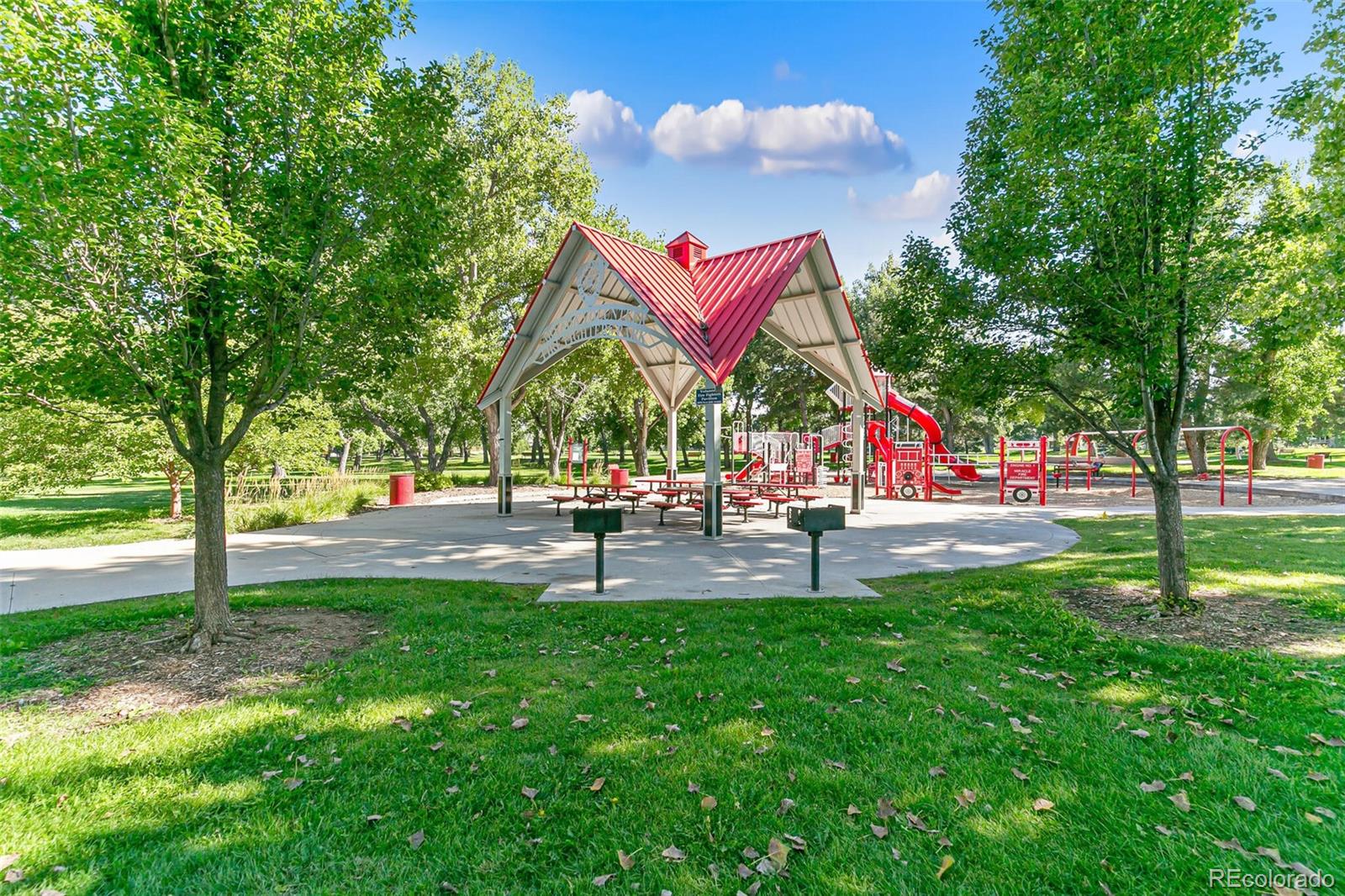 8417 Everett Way, Unit C Arvada, CO 80005 - Photo 34 of 34 a park with lots of green space and building