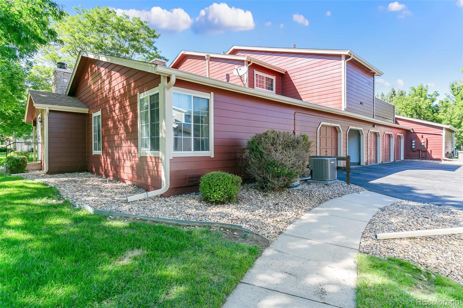 8417 Everett Way, Unit C Arvada, CO 80005 - Photo 4 of 34 a view of a house with a yard