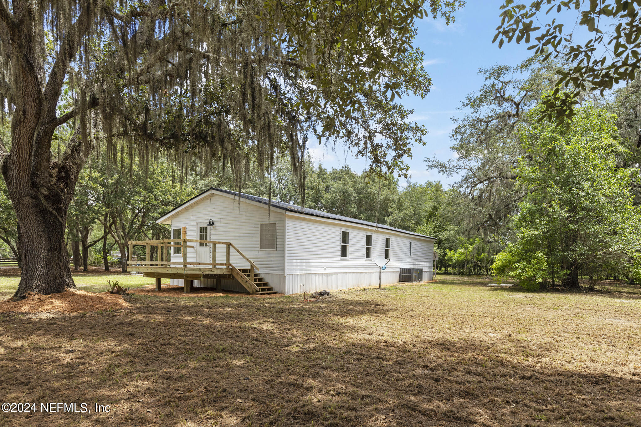 135 Sand Lake Road Interlachen, FL 32148 - Photo 34 of 53 135 Sand Lakes Dr-035-07192024