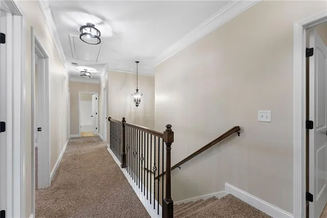 a view of a hallway with closet area