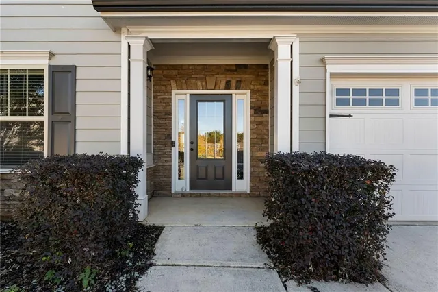 a view of a house with a garden