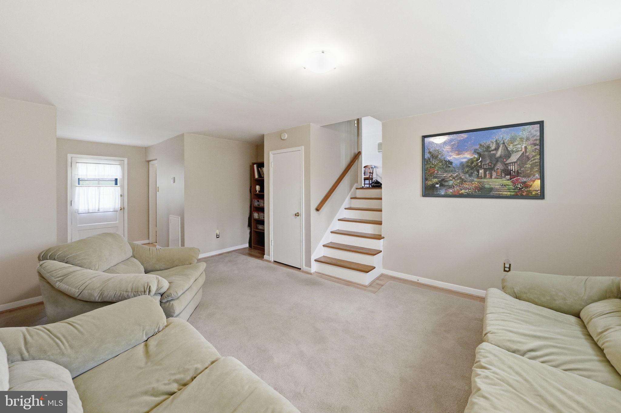 28 Green Ridge Road Yardley, PA 19067 - Photo 21 of 49 a living room with furniture and a large window