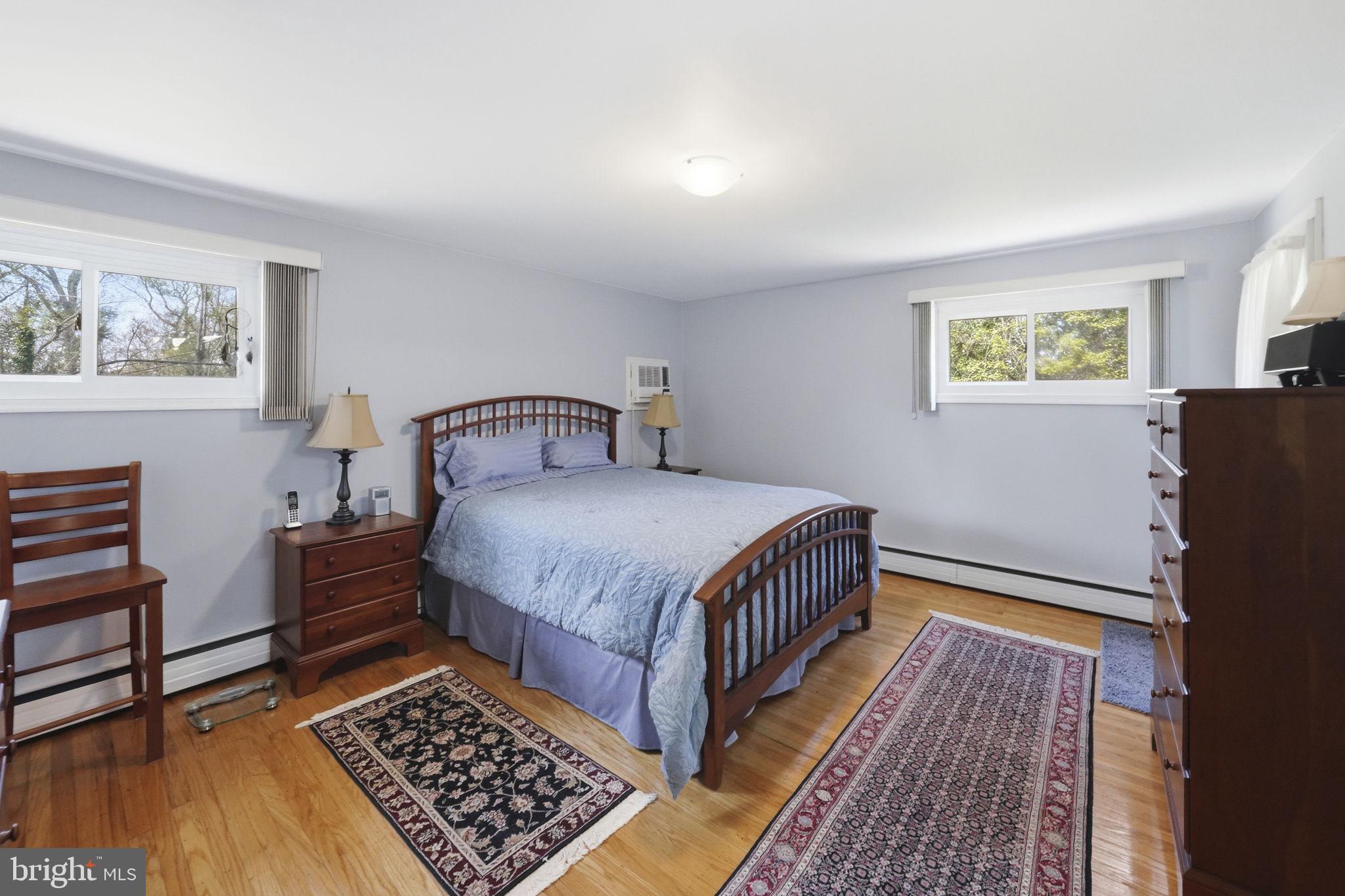 28 Green Ridge Road Yardley, PA 19067 - Photo 27 of 49 a bedroom with a bed and a window