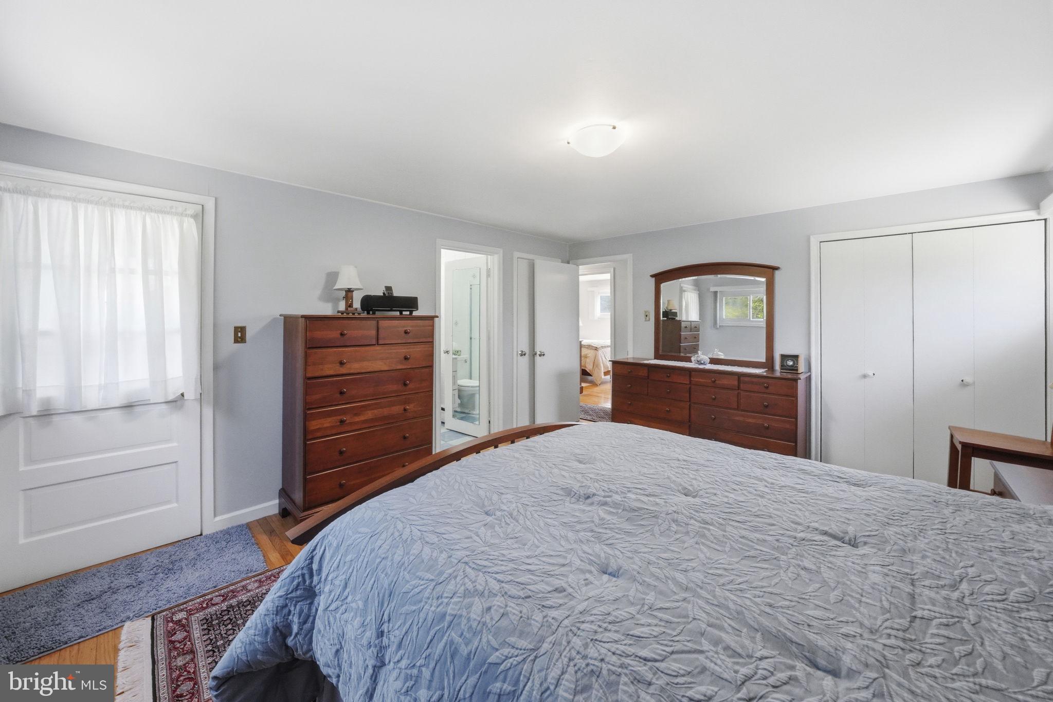 28 Green Ridge Road Yardley, PA 19067 - Photo 29 of 49 a bedroom with a bed and a dresser