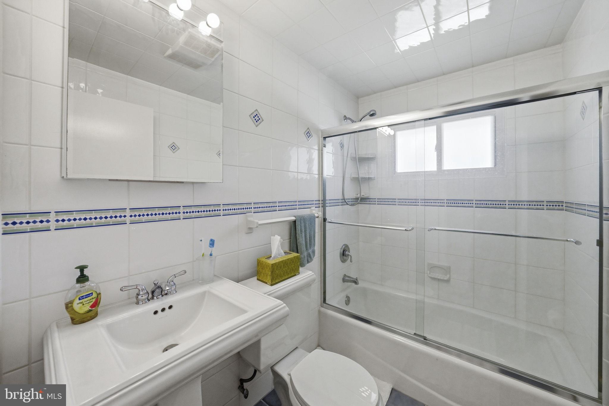28 Green Ridge Road Yardley, PA 19067 - Photo 33 of 49 a bathroom with a sink a toilet and shower