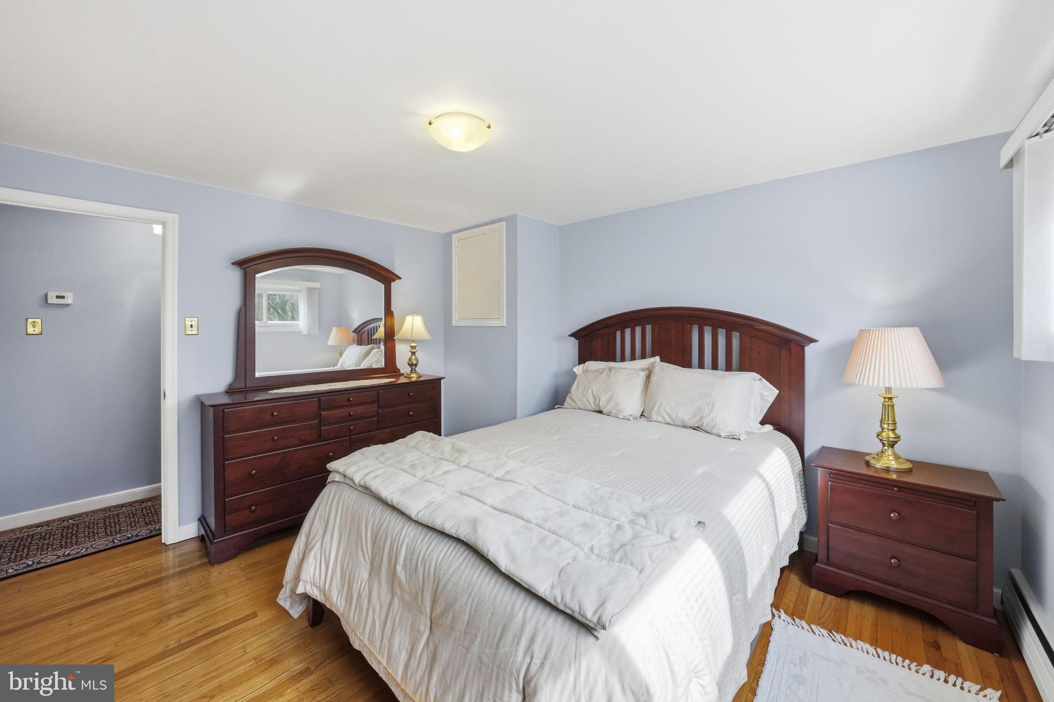 28 Green Ridge Road Yardley, PA 19067 - Photo 35 of 49 a bedroom with a bed and a dresser