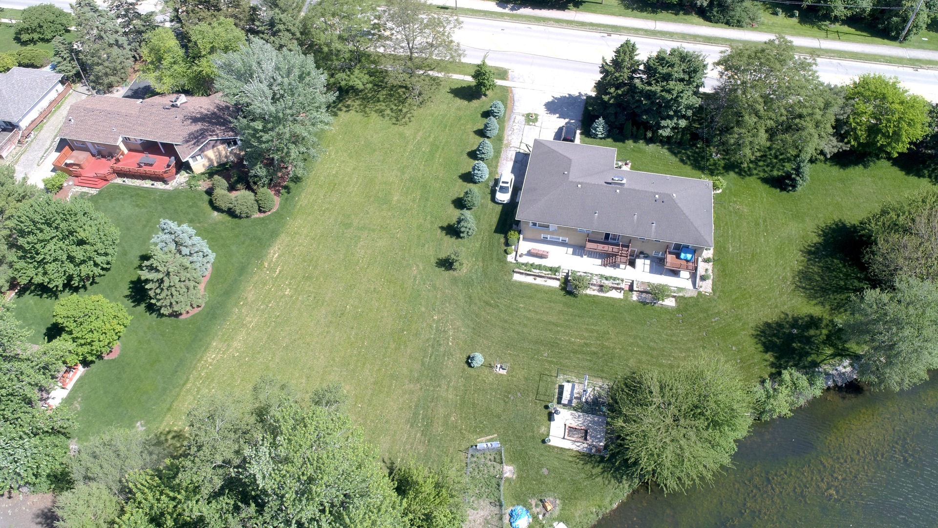 806 Plainfield Road Downers Grove, IL 60516 - Photo 6 of 16 an aerial view of residential house with outdoor space and trees all around