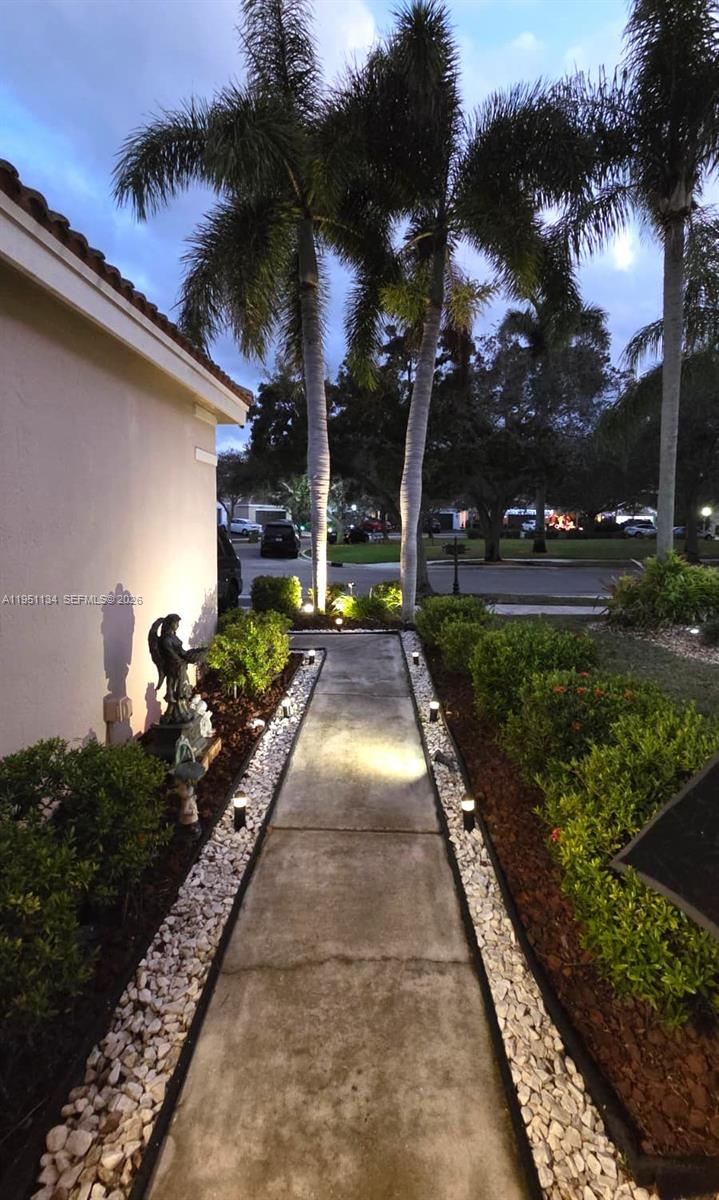 1308 Alexander Bend Weston, FL 33327 - Photo 32 of 54 a view of a yard with plants