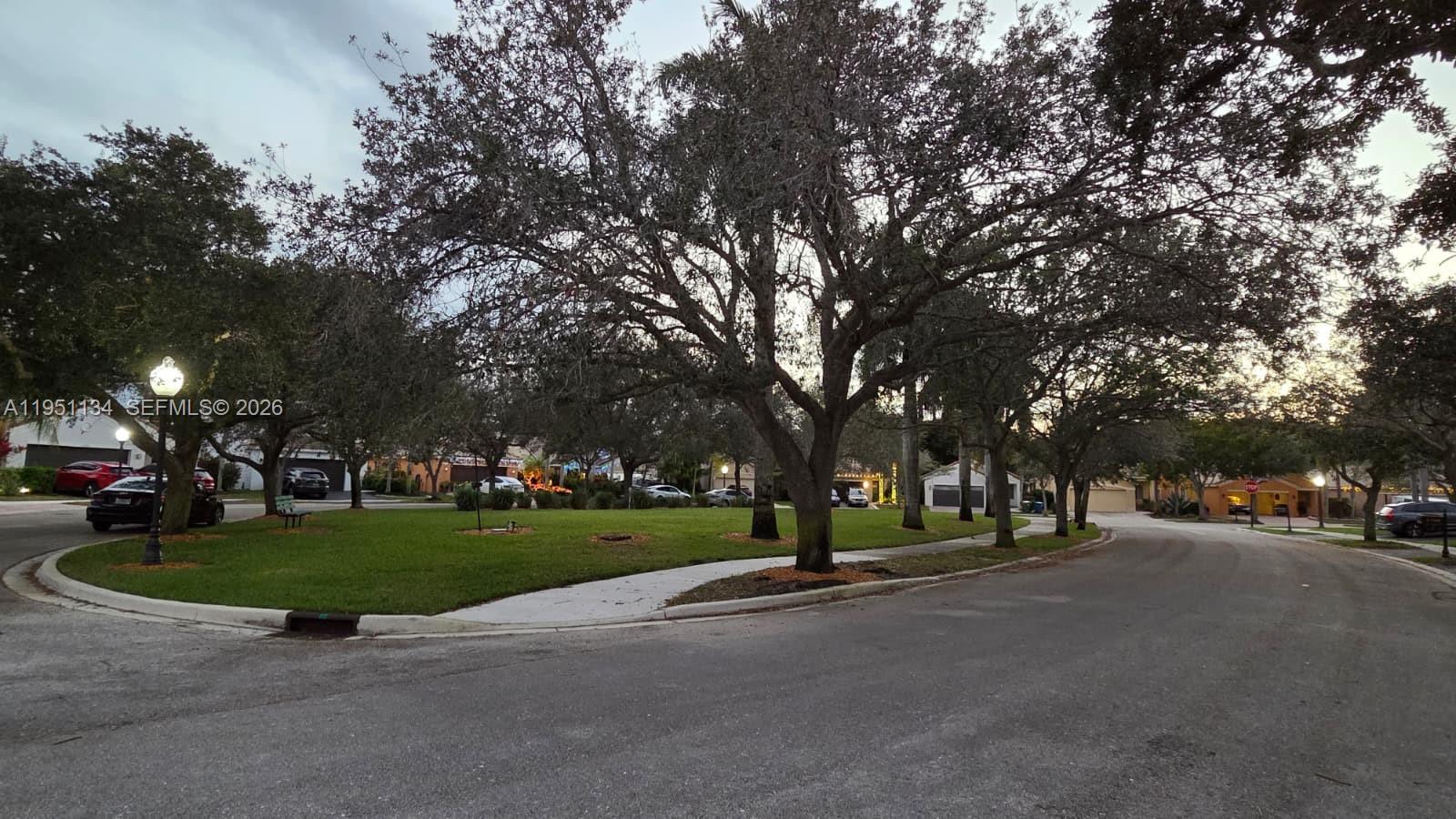 1308 Alexander Bend Weston, FL 33327 - Photo 42 of 54 a view of a park with tree s