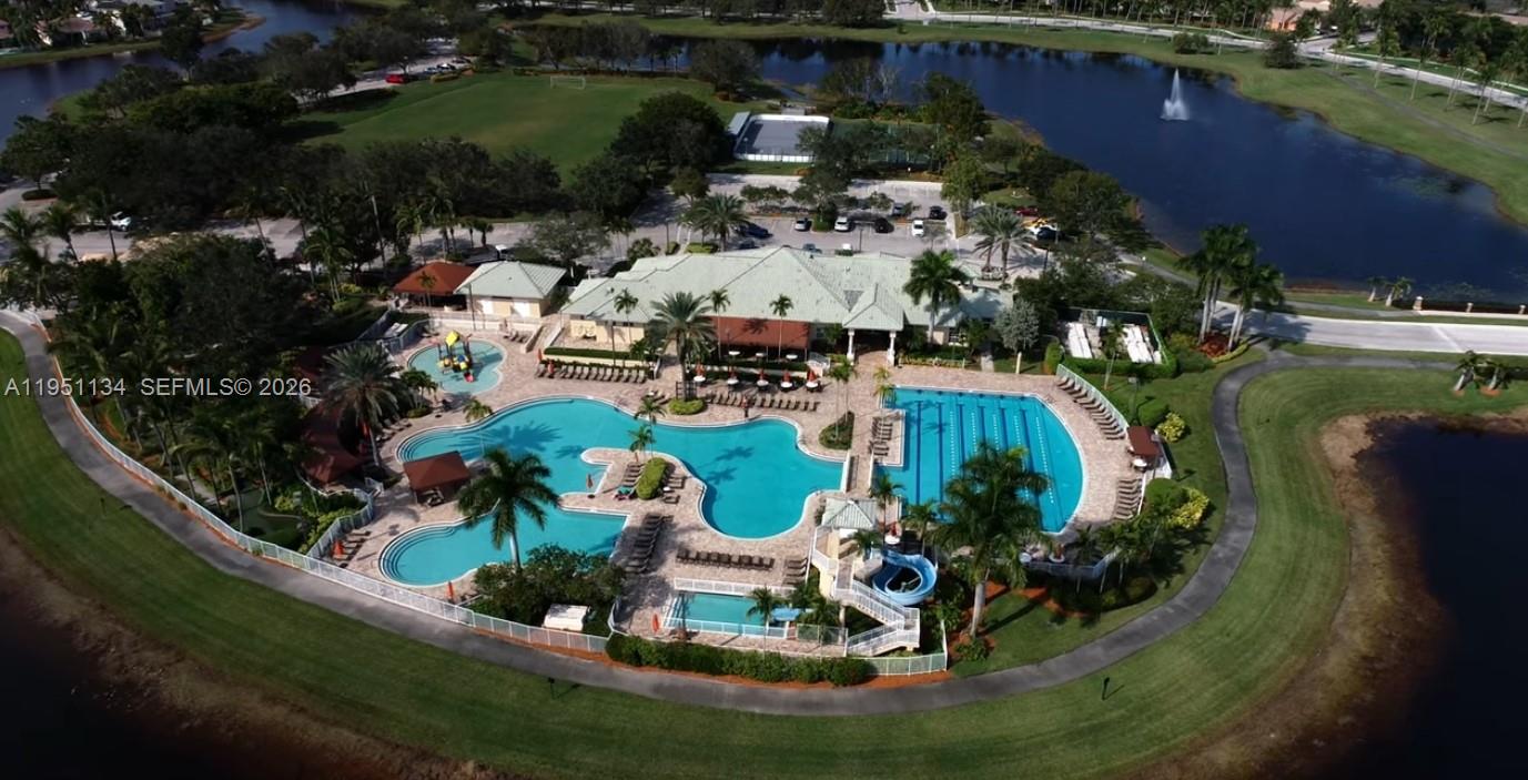 1308 Alexander Bend Weston, FL 33327 - Photo 47 of 54 an aerial view of a house with yard swimming pool and outdoor seating