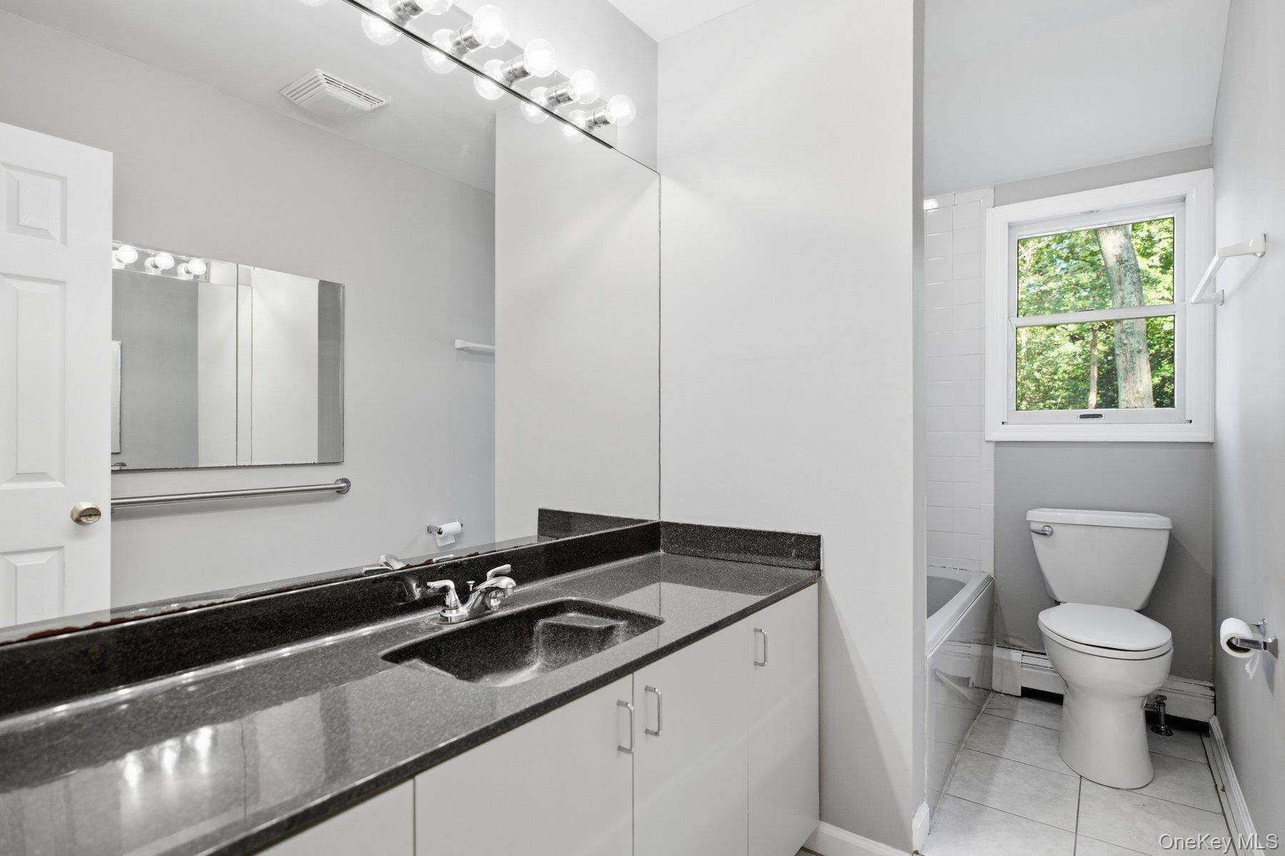 65 Holbrook Road Centereach, NY 11720 - Photo 12 of 28 1st Floor Full Bath