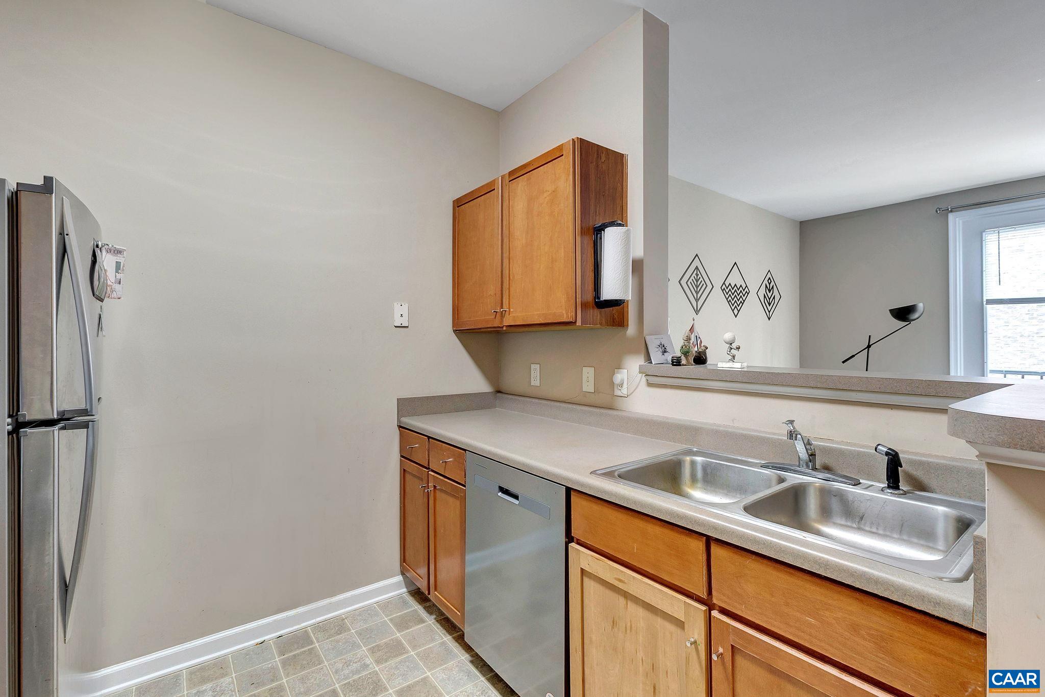 745 Walker Square, Unit 3C Charlottesville, VA 22903 - Photo 3 of 10 a bathroom with a sink and a mirror