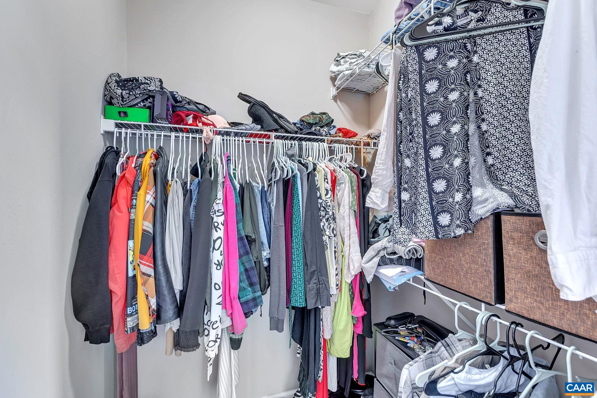 745 Walker Square, Unit 3C Charlottesville, VA 22903 - Photo 4 of 10 a view of walk in closet with clothes