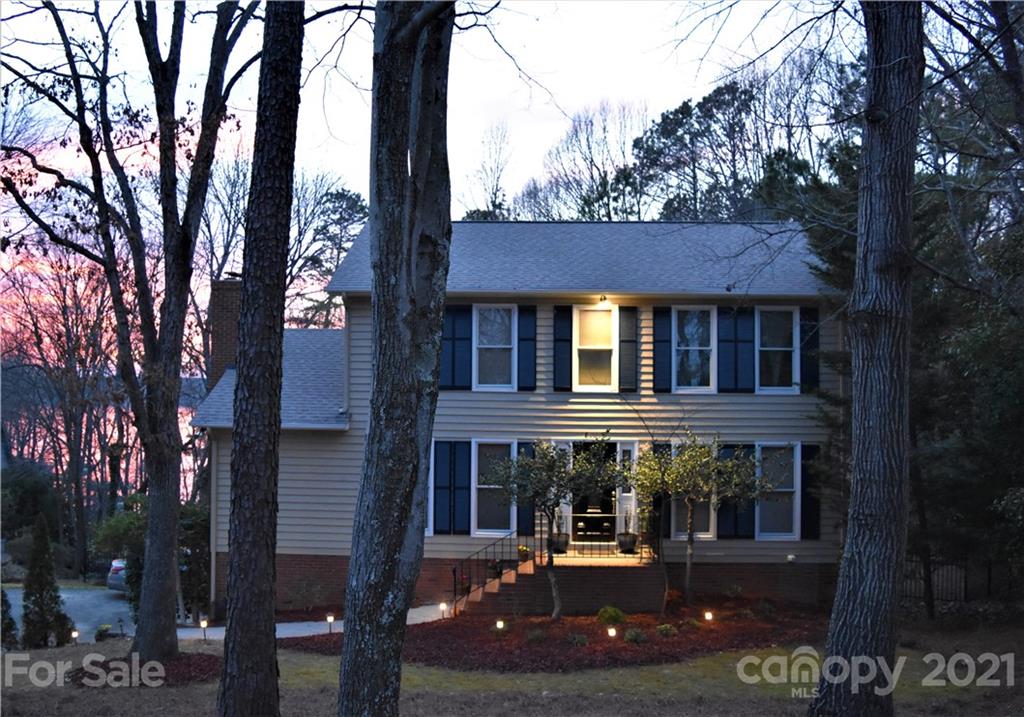 29032 Snapper Point Tega Cay, SC 29708 - Photo 3 of 48 a view of a house with backyard and sitting area