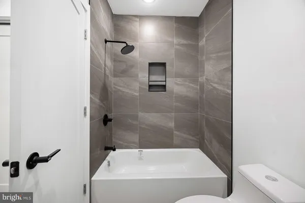 a bathroom with a bathtub