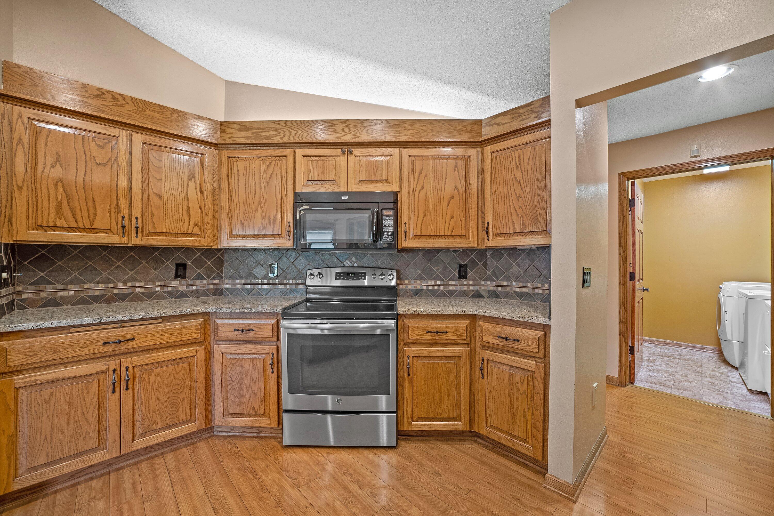 613 Bayview Road Mukwonago, WI 53149 - Photo 25 of 58 Kitchen w/ Plenty of Cabinets