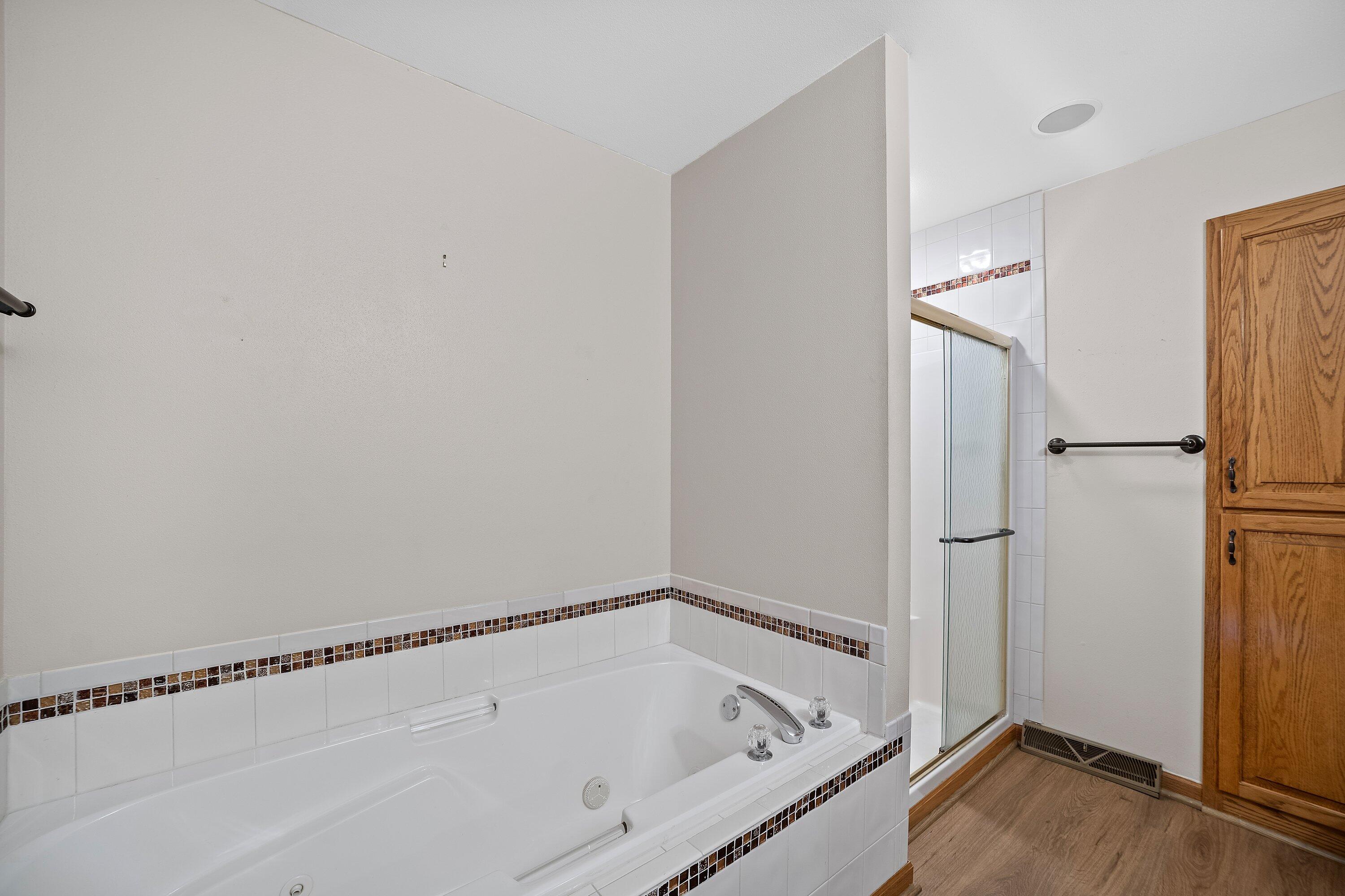 613 Bayview Road Mukwonago, WI 53149 - Photo 33 of 58 Master Bathroom Tub and Walk-in Shower