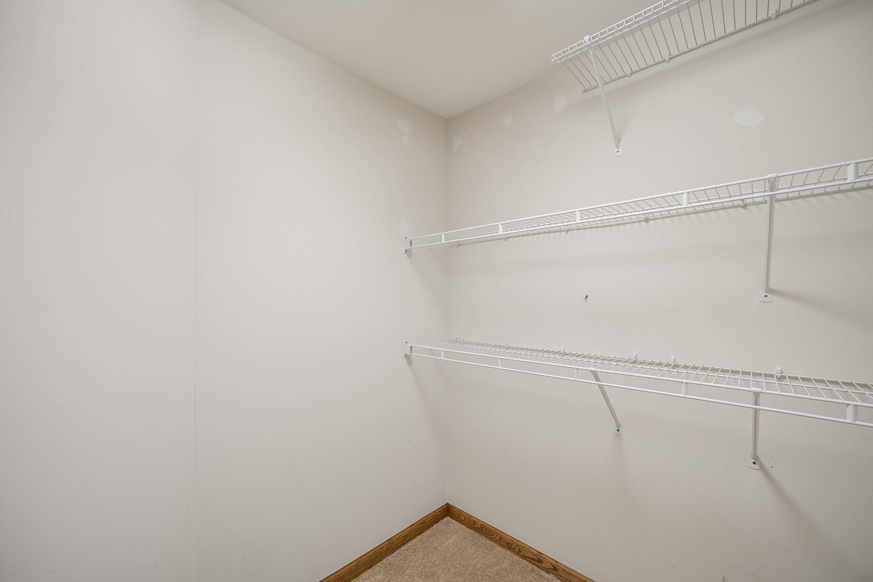 613 Bayview Road Mukwonago, WI 53149 - Photo 34 of 58 Master Bedroom Walk-In Closet