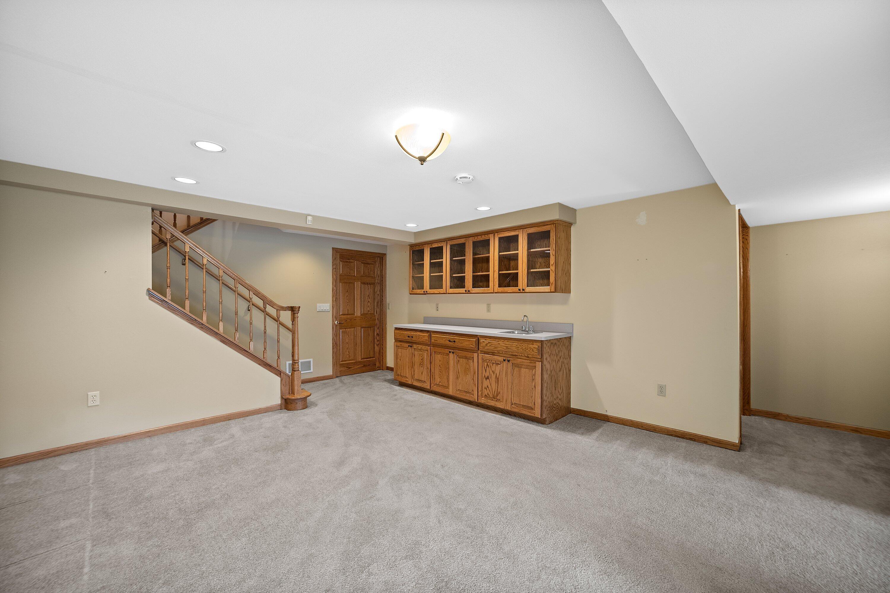 613 Bayview Road Mukwonago, WI 53149 - Photo 43 of 58 Rec Room w/ Built in Cabinets